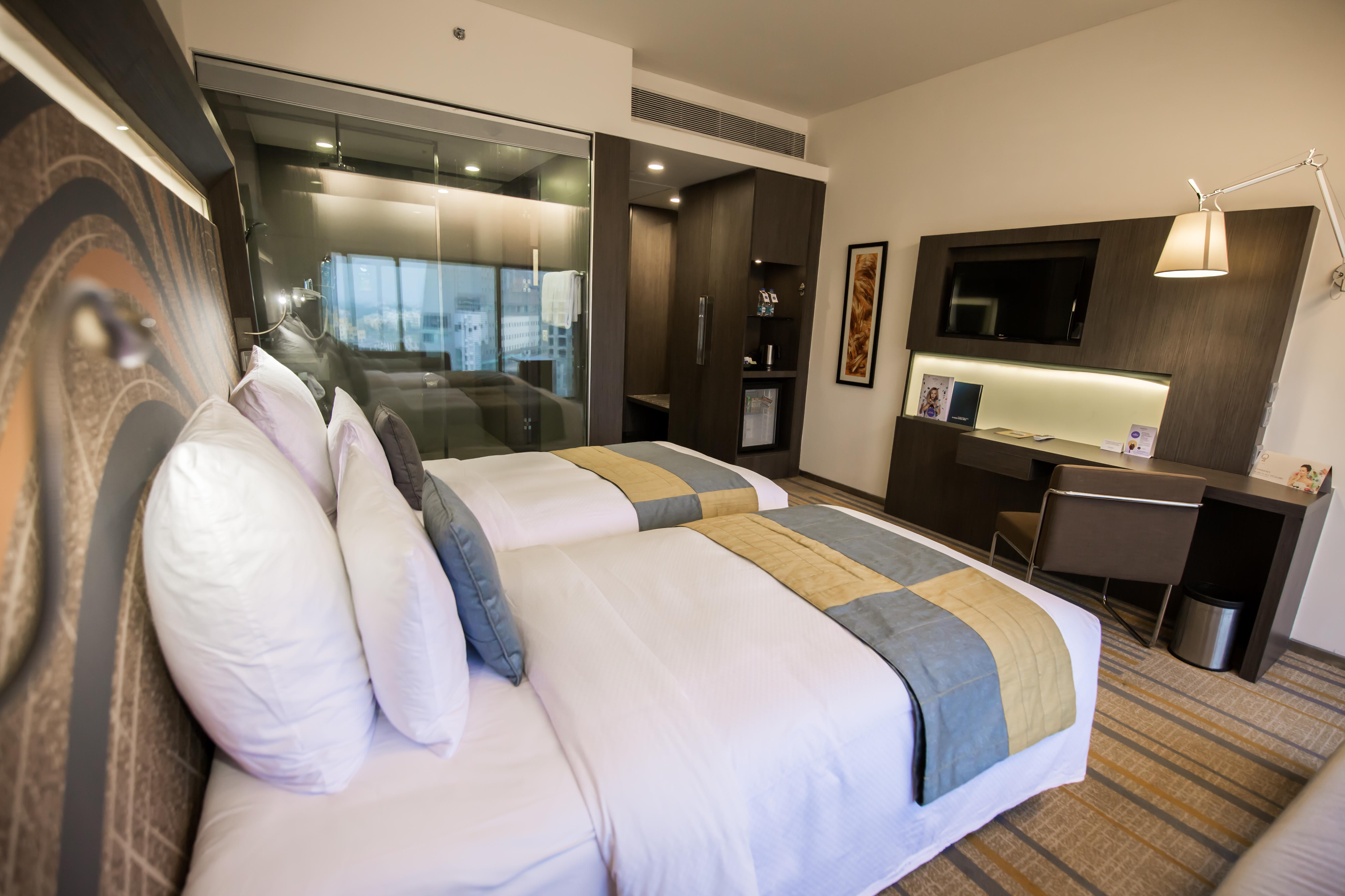 Novotel Kolkata Hotel And Residences Exterior photo A room at the hotel