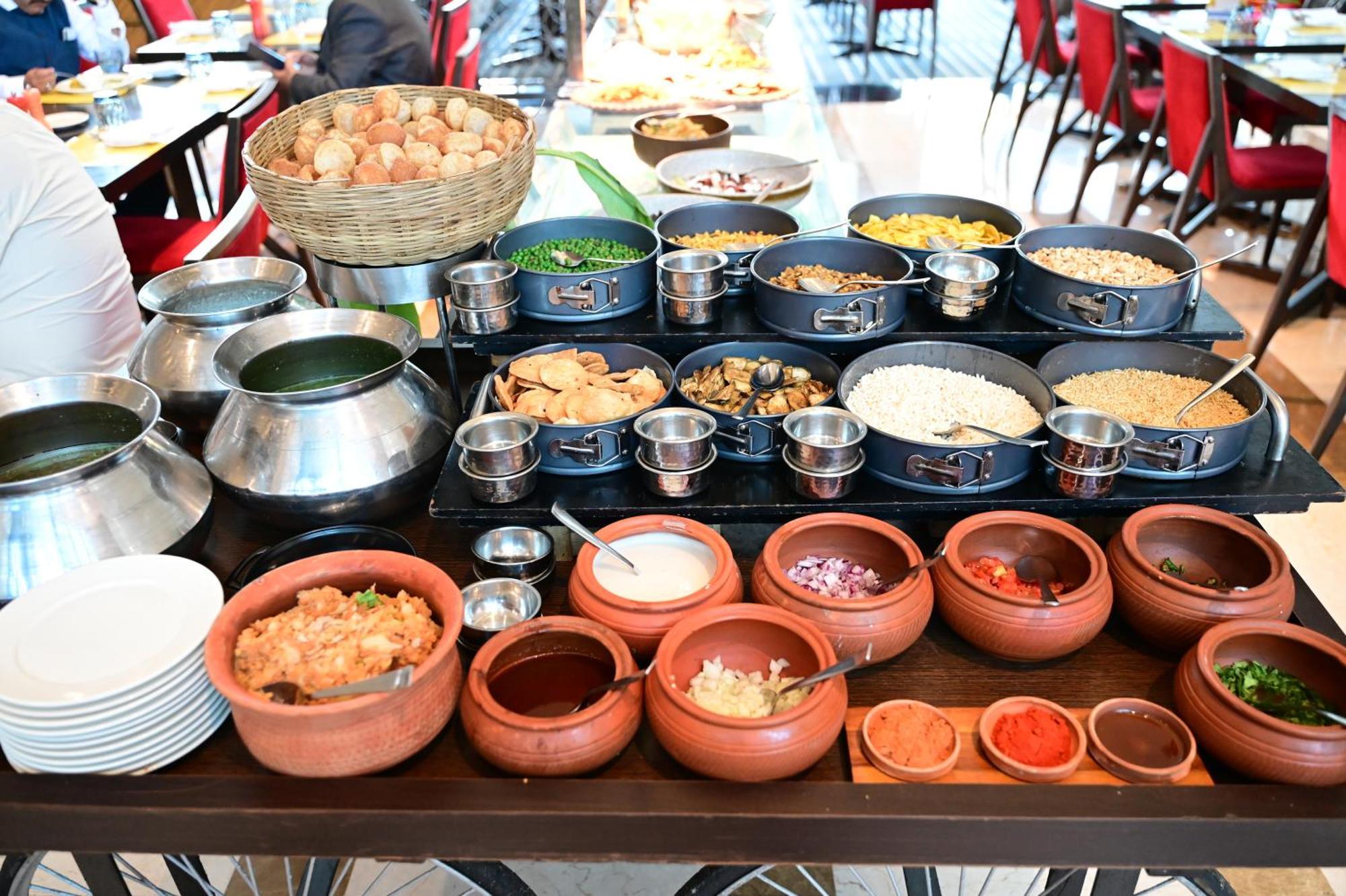 Novotel Kolkata Hotel And Residences Exterior photo Indian cuisine