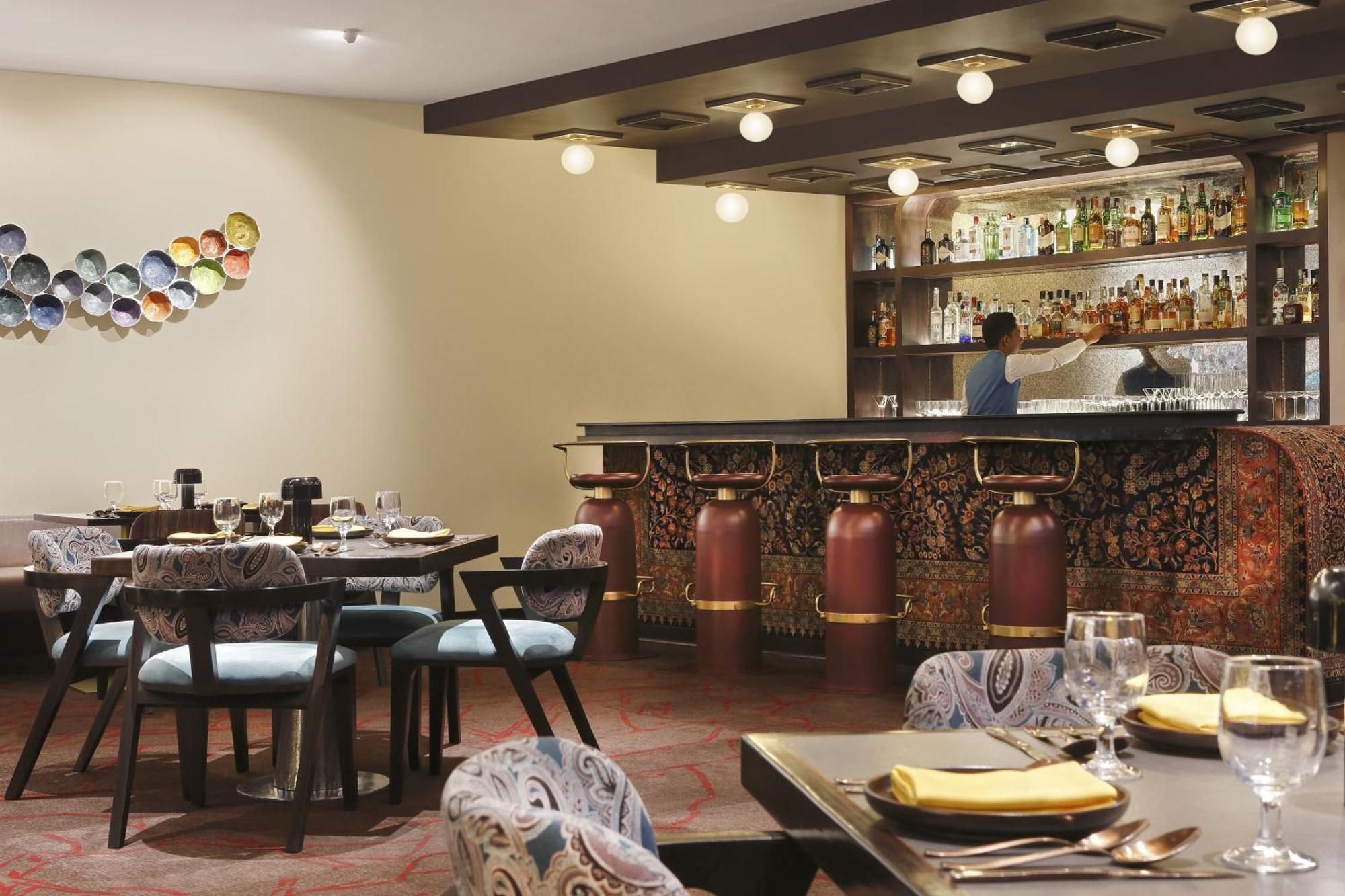 Novotel Kolkata Hotel And Residences Exterior photo The bar at the restaurant